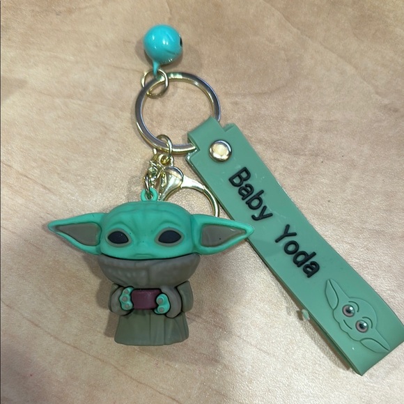 Disney Other - Baby Yoda Keychain Star Wars baby Yoda holding cup silicone keychain